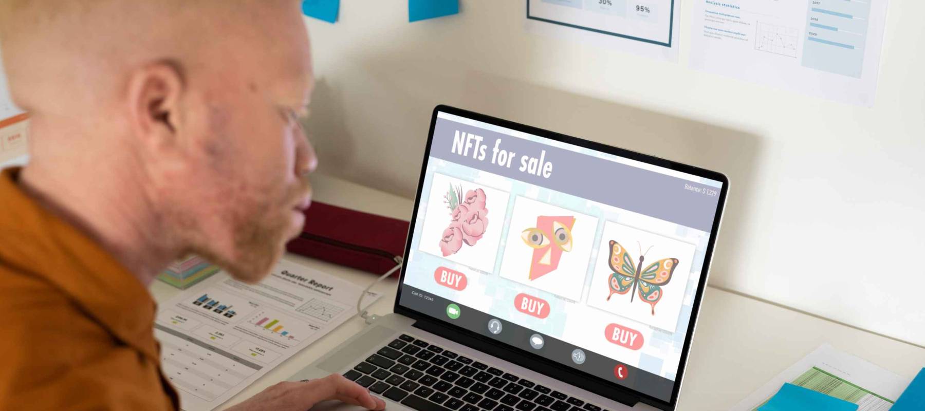 African american albino businessman researching on nfts while working