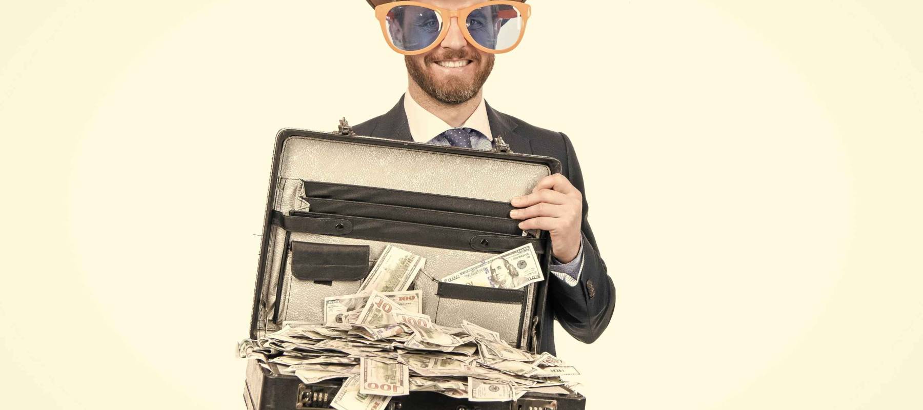 Get a million dollars. Rich man. Businessman hold suitcase with cash money. Win cash prize