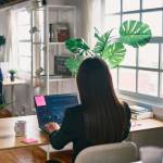 Multiracial business people working inside hedge fund office - Focus on screen