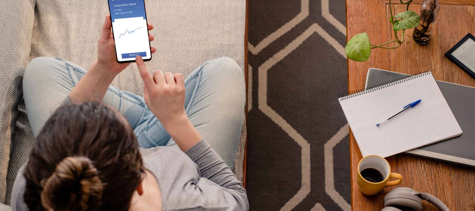 Woman using investment mobile app
