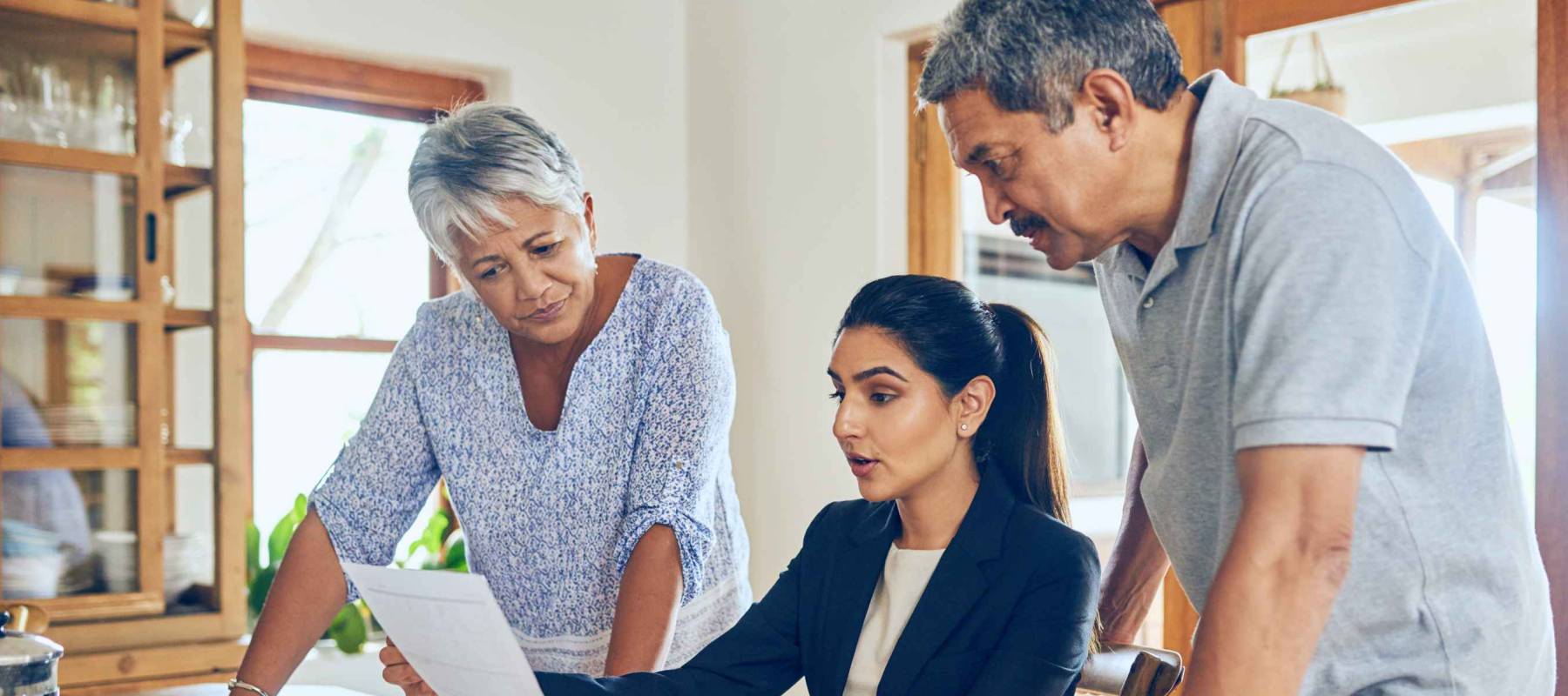 We have a range of retirement portfolios on offer. Shot of a mature couple getting advice from their financial consultant at home.