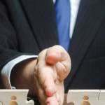 A businessman splits money into two equal parts. Distribution of funds. Saving, investing. Property business division. Divorce and legal services. Financial strategic budget management.
