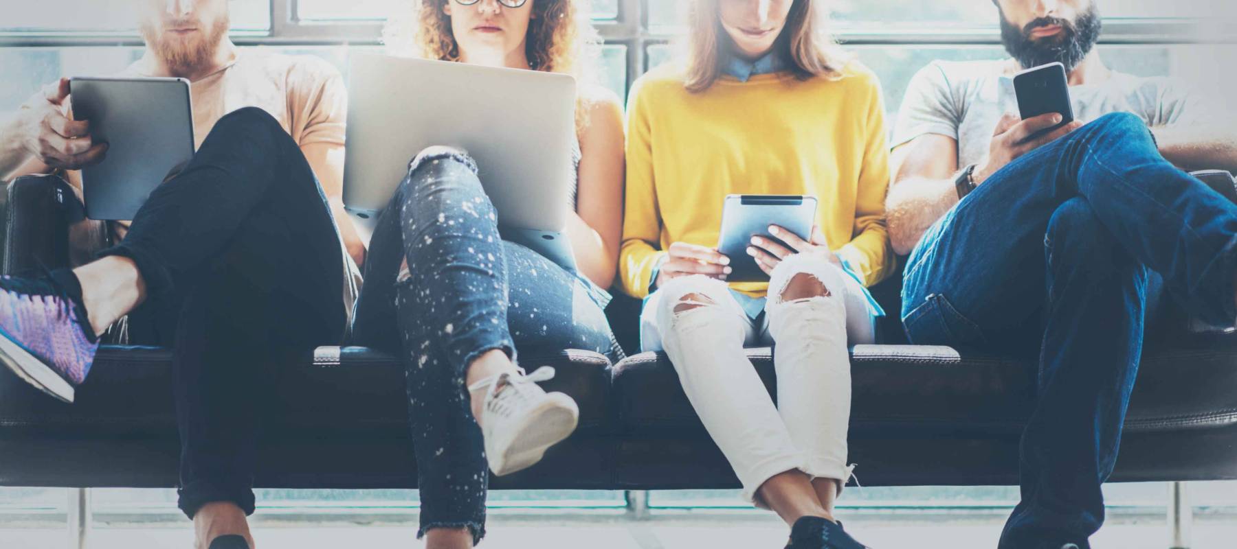 Group Adult Hipsters Friends Sitting Sofa Using Modern Gadgets