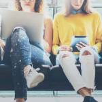 Group Adult Hipsters Friends Sitting Sofa Using Modern Gadgets