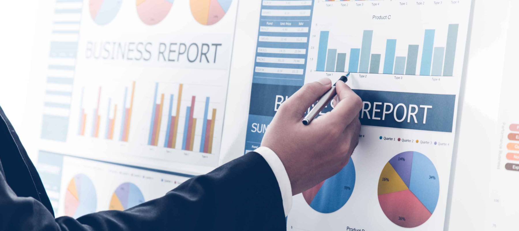 Businessman analyzing investment charts. Accounting