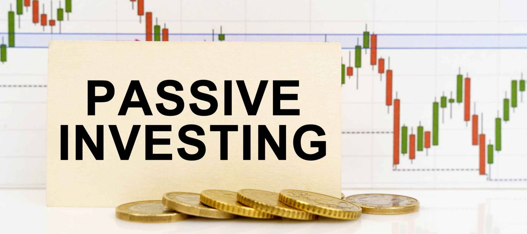 Business concept. Against the background of the quotes chart, a business card with the inscription - Passive Investing