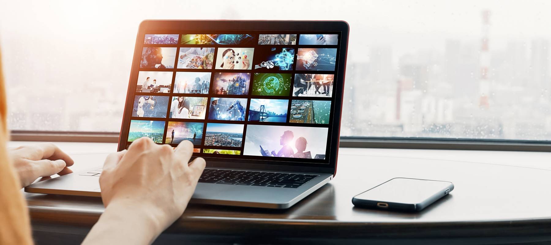Woman watching a photo library.