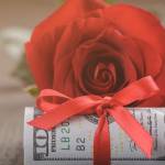 red heart and dollar, love concept, close up