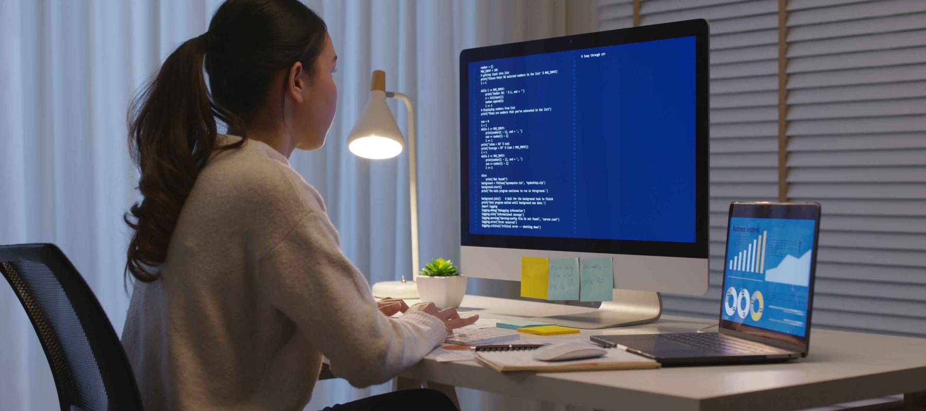 Asian college woman work busy at late night home office online study on laptop typing coding search data cyber class remote virtual learn.