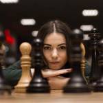 beautiful girl playing chess