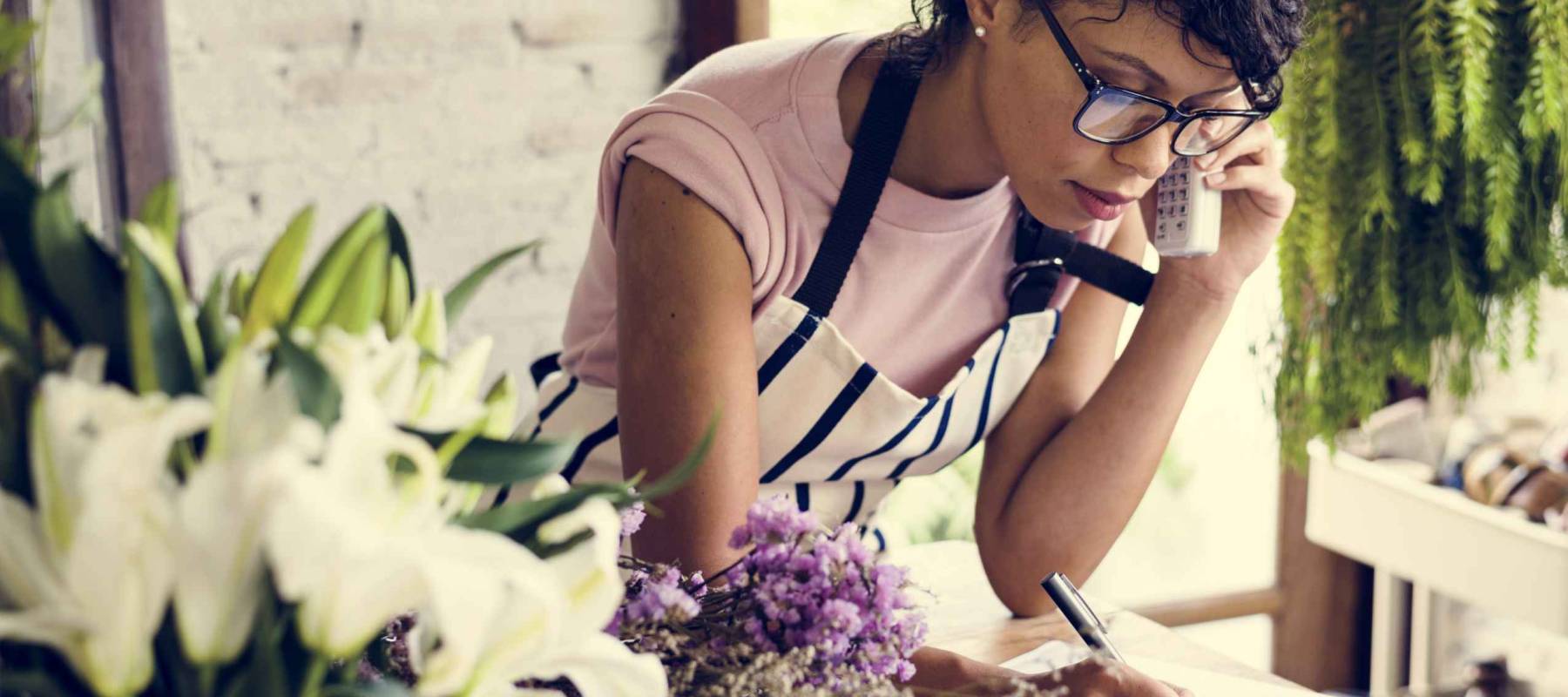 Business of flower shop with woman owner