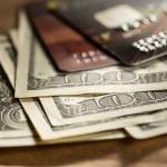 Credit cards and dollars in cash