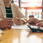 Businessman and Certified financial planner at teamwork concept meetings.