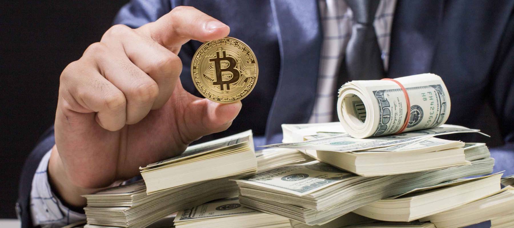 Businessman receive a lot of Money from Smartphone, Businessman Holding Bitcoin Isolated on black background, Digital Money and Bitcoine Concept.