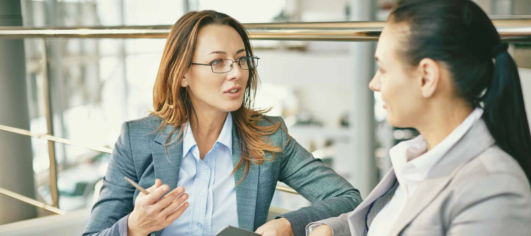 Hr manager asking questions to female candidate