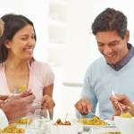 Multi-generational family gathers for dinner