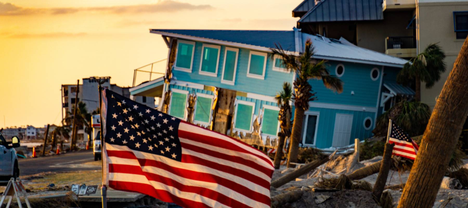 A home destroyed by Hurricane Michael, lifted off its foundations and pushed into another building.