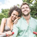 Happy couple having fun on a boat