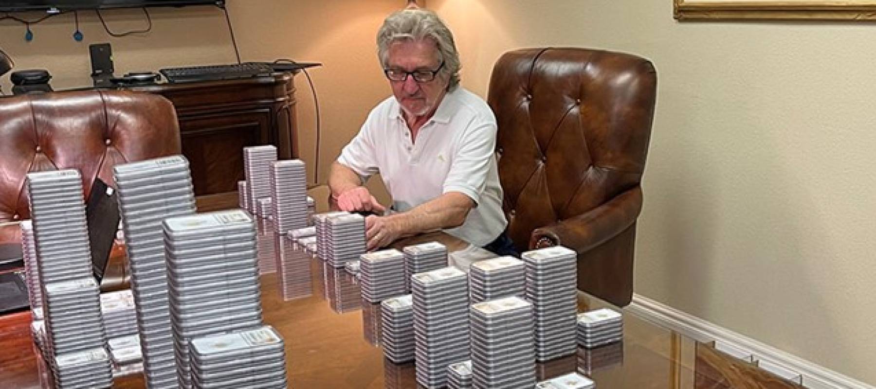 Jeff Garrett is shown with the coins after grading.
