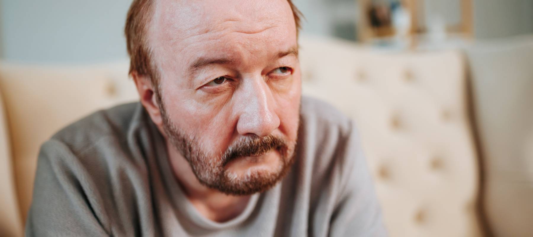 A man feeling frustrated, anxious and worried.