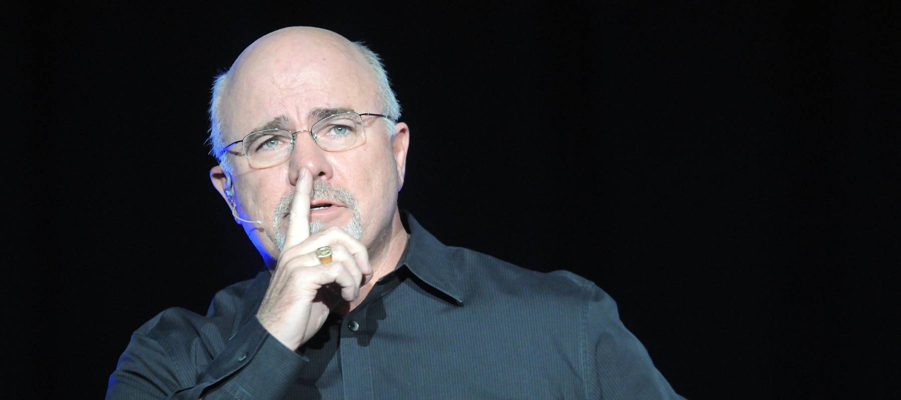 Personal finance guru Dave Ramsey speaks to a crowd at the Cox Convention Center in Oklahoma City, Okla., Feb. 19, 2011.