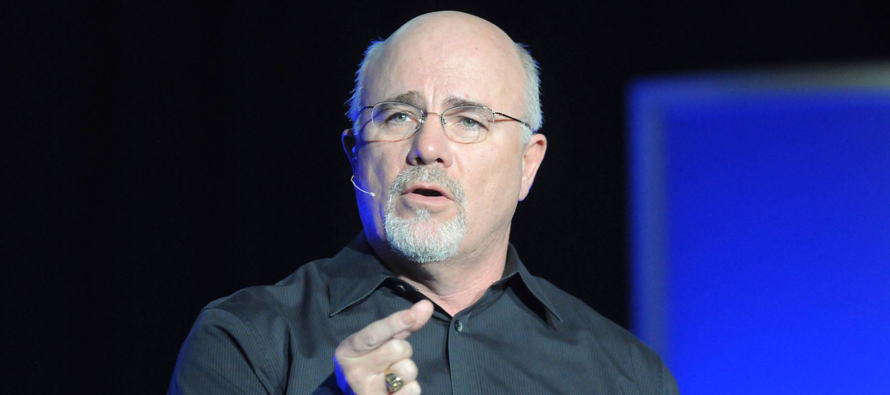 Personal finance expert Dave Ramsey speaks to a crowd at the Cox Convention Center in Oklahoma City, Okla., Feb. 19, 2011.