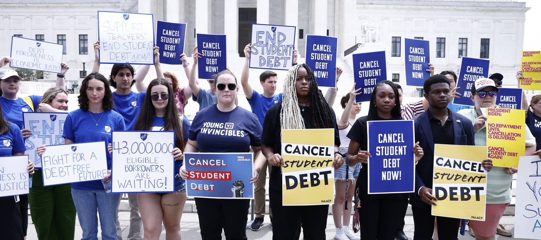 Supporters of student debt forgiveness demonstrate with signs outside the US Supreme Court on June 30, 2023, in Washington, DC.