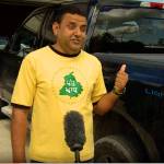 Dalbir Bana poses in front of his Ford pickup truck.