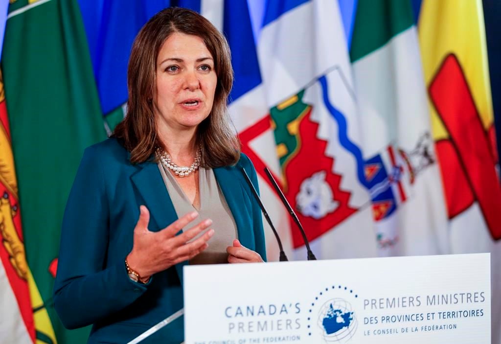 Danielle Smith, Premier of Alberta, speaks to media in Winnipeg, Tuesday, July 11, 2023. Smith is set to release a report that could lead to a vote on whether Alberta should ditch the Canada 
