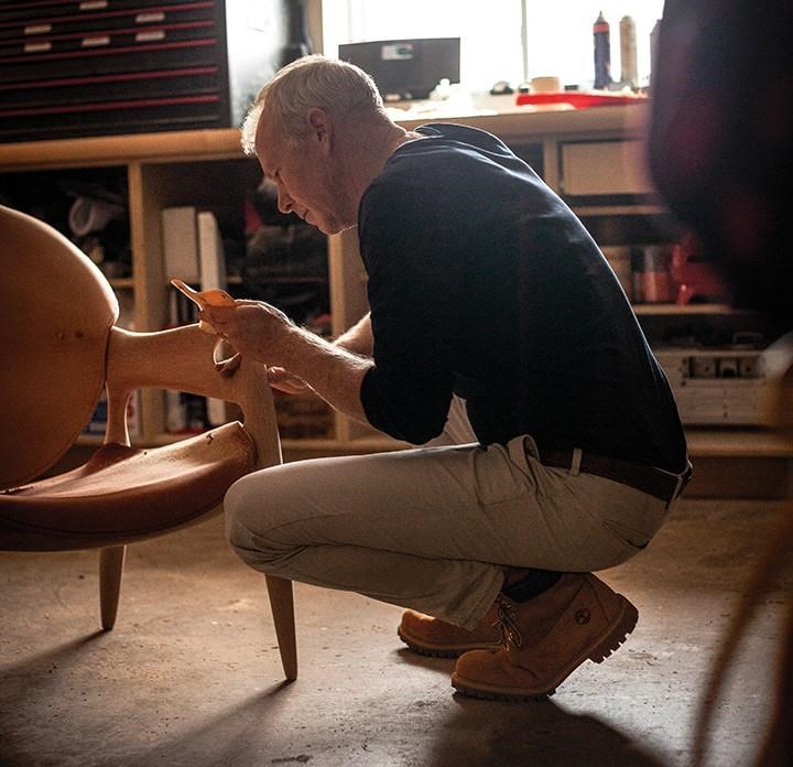 Furniture maker Jonathan Otter works on a chair in a handout photo. The work, titled &quot;solace&quot;, is being sold as part of a fundraiser for Atlantic Canadians harmed by post-tropical storm Fiona
