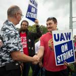 nited Auto Workers President Shawn Fain greets UAW members as they strike the General Motors Lansing Delta Assembly Plant on September 29, 2023 in Lansing, Michigan.