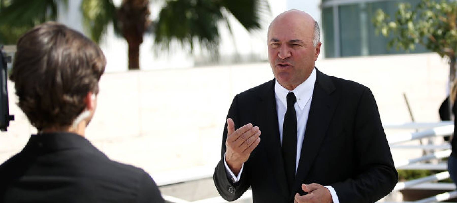 Kevin O'Leary attends the premiere of ABC's "Shark Tank" Season 9 at The Paley Center for Media and speaks to cameras.