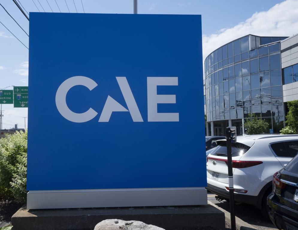 The CAE logo is seen in front of the aerospace company&amp;rsquo;s plant, Thursday, July 21, 2022 in Montreal. 