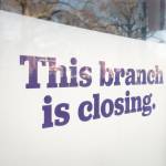 Branch closing sign in window