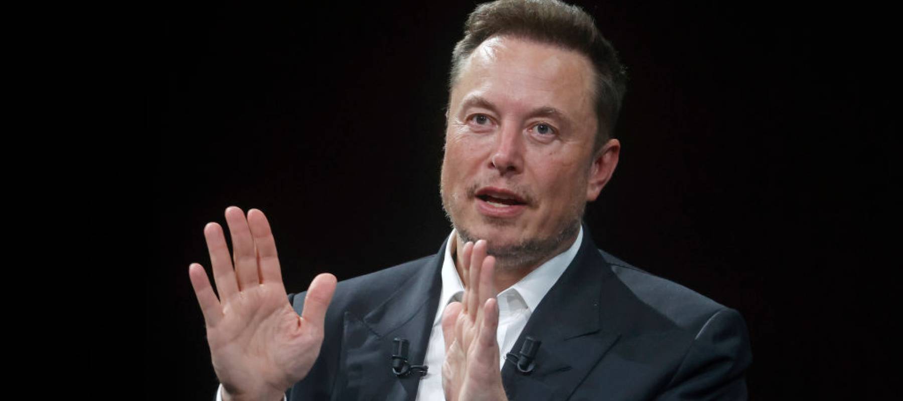 Chief Executive Officer of SpaceX and Tesla and owner of Twitter, Elon Musk gestures as he attends the Viva Technology conference.