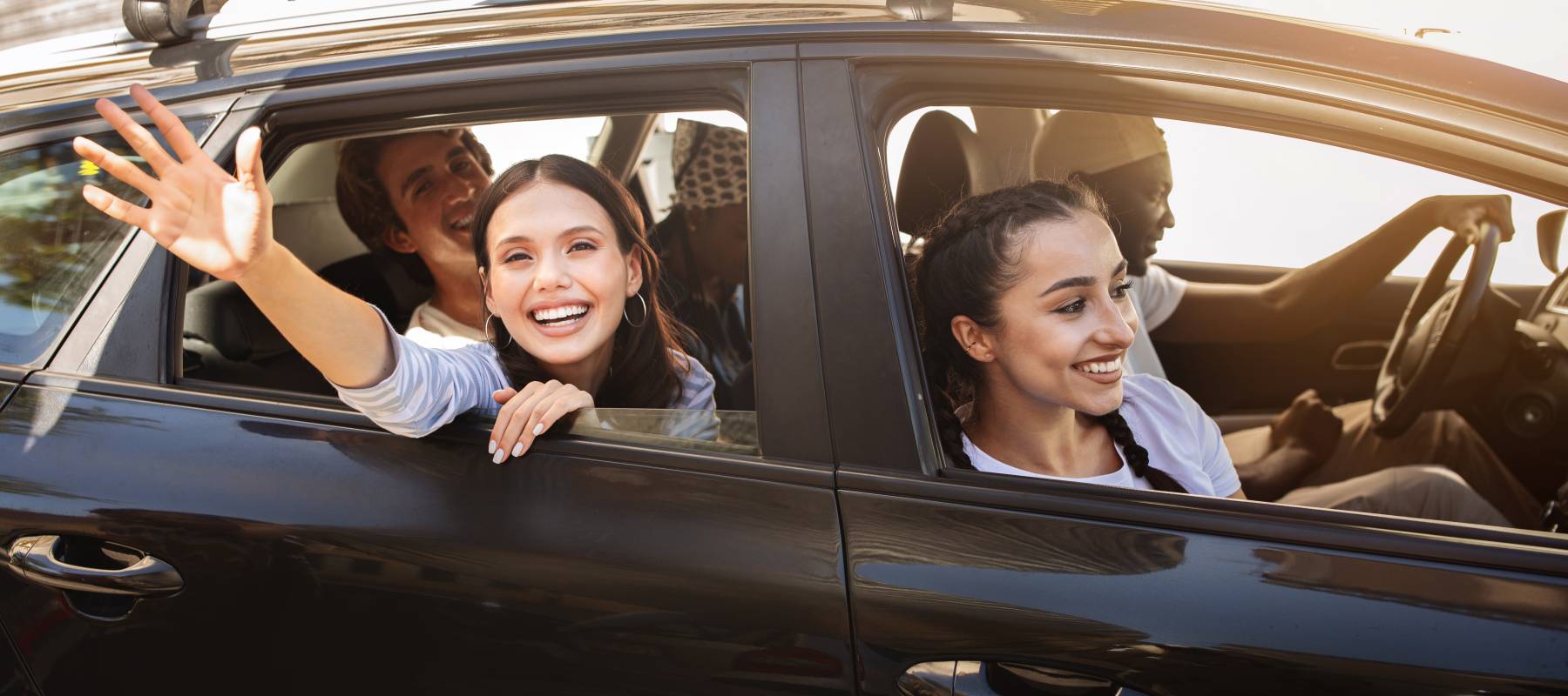 A group of young people enjoying a road trip.