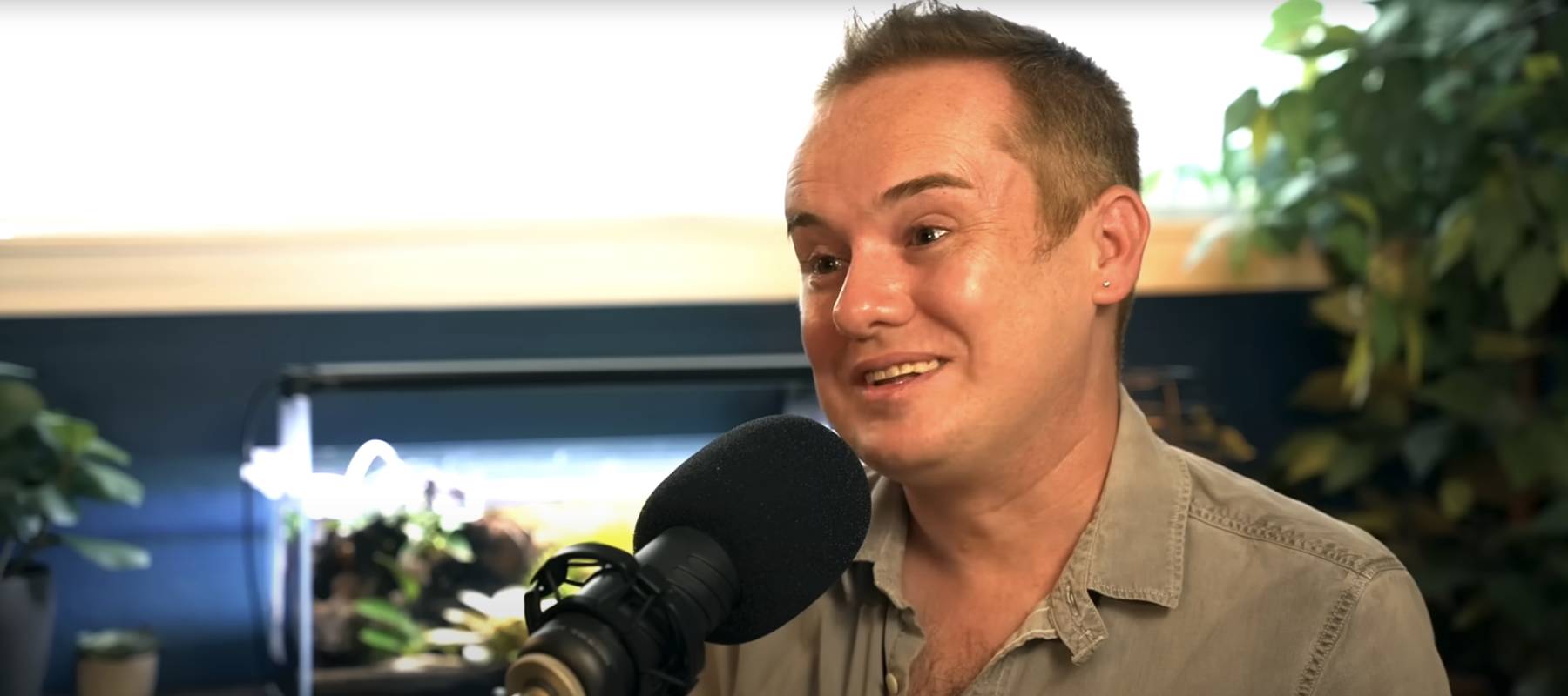 Caleb Hammer (not shown) speaks with Brent (right) about his financial situation.