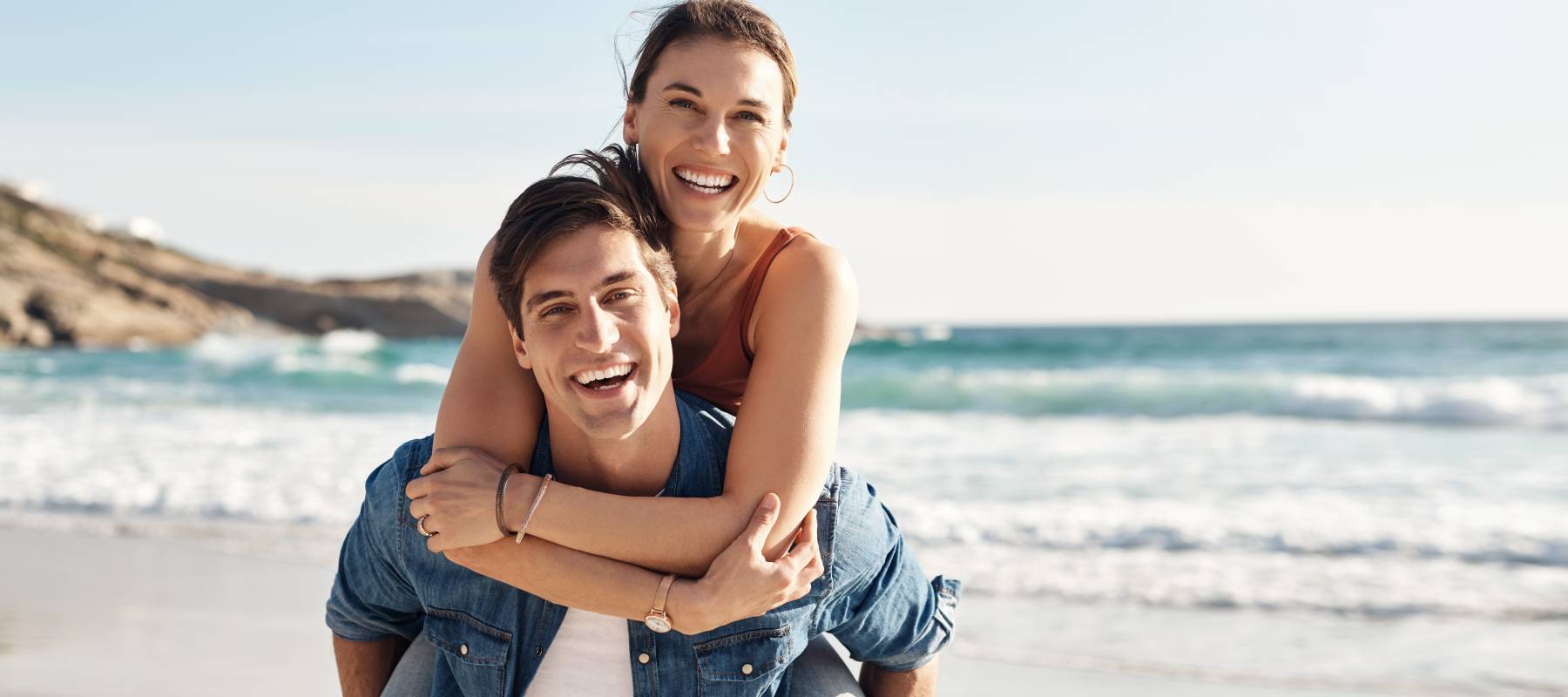 A middle-age couple at the beach.