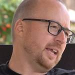 Mark Jenney speaks with Noah Kagan (not shown) about going from homeless as a child to a self-made millionaire.