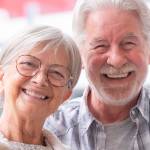 An older couple enjoy a day of shopping.