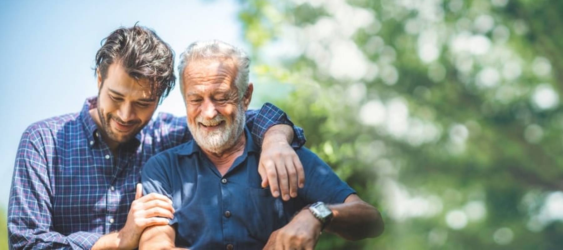 adult father and son outside