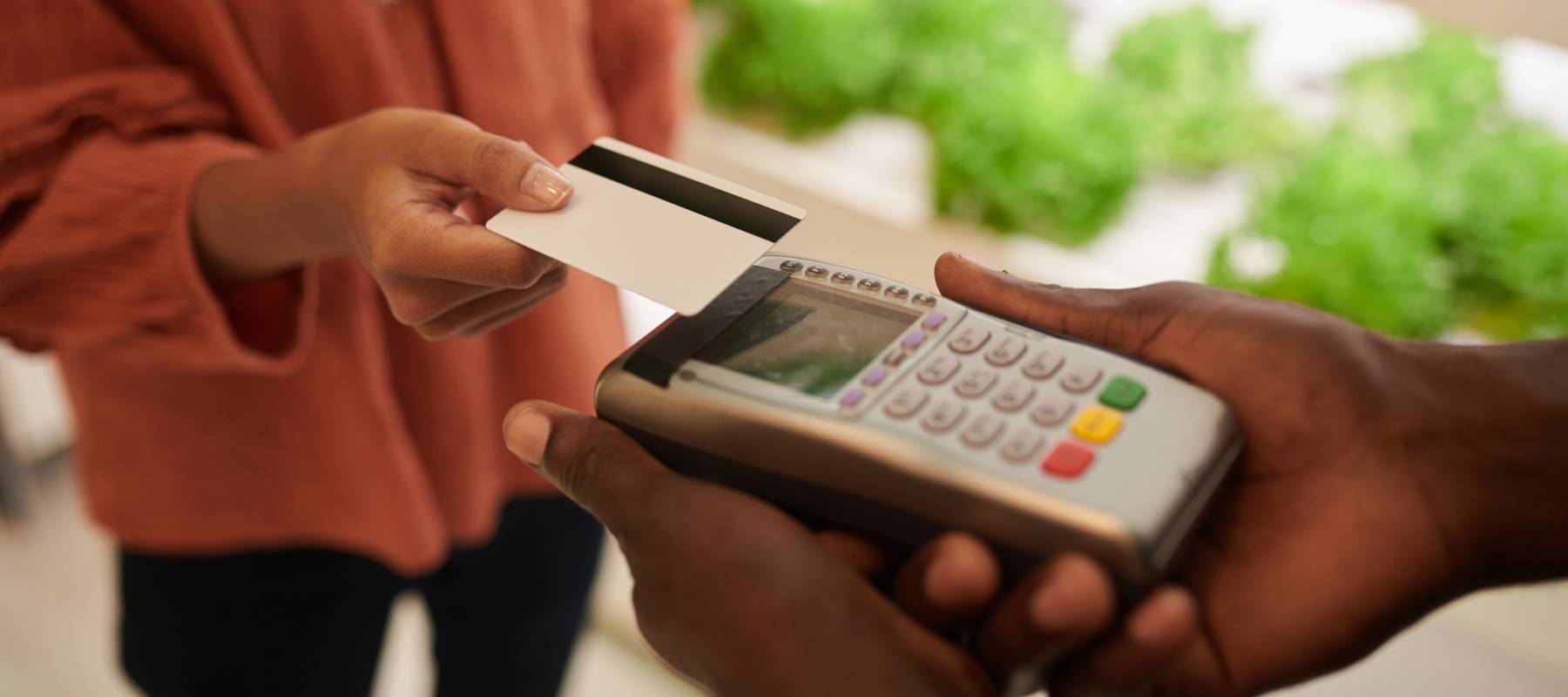 Paying with a credit card.