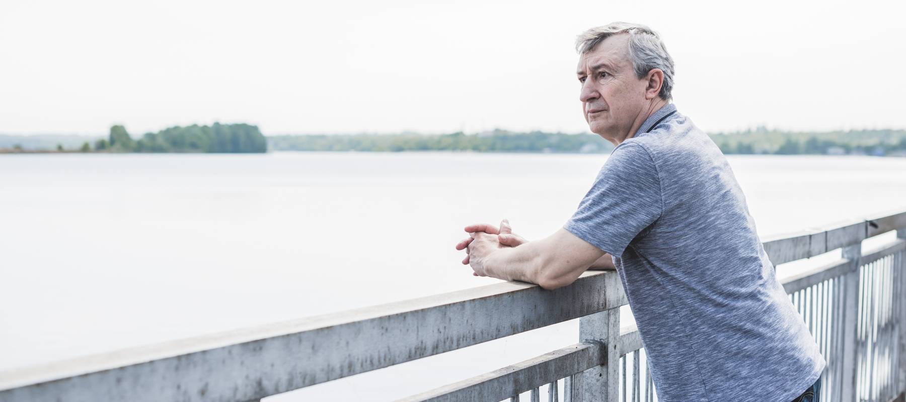 Senior man with a sad philosophical mood worried about something. The concept of life after 50 years, problems and depression. Crisis of middle age