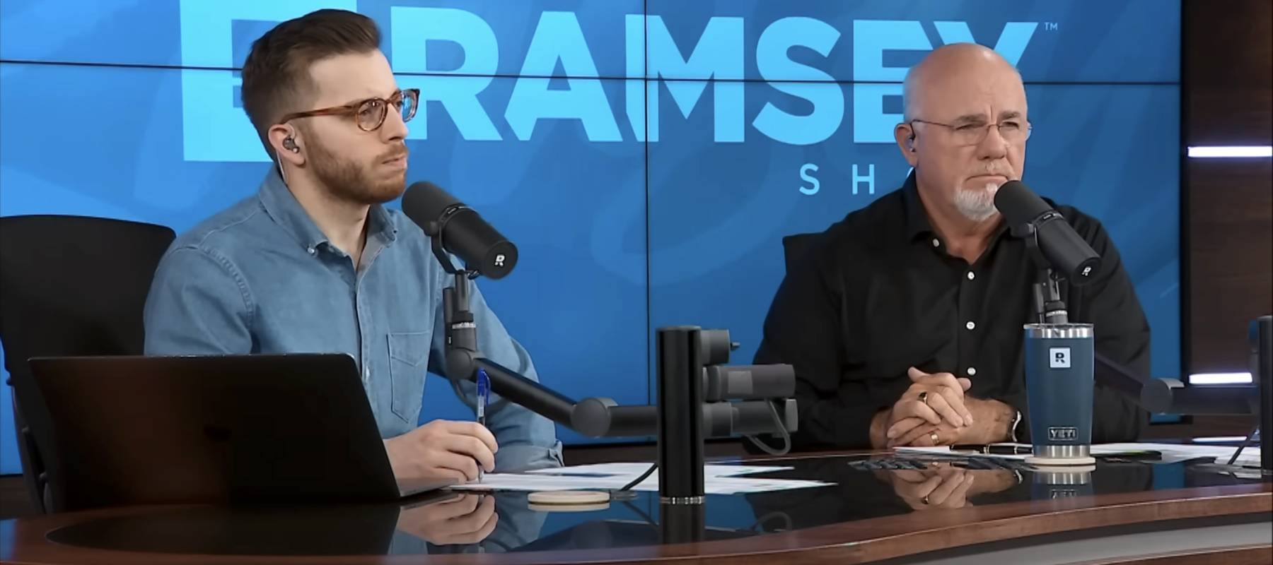 Radio host Dave Ramsey (right) and co-host George Kamel speak with Ashley on &quot;The Ramsey Show.&quot;