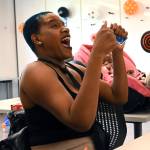 Canethia Miller plays Uno at Martha's Table during a meet and greet for the Strong Families Strong Futures participants in Washington, D.C.