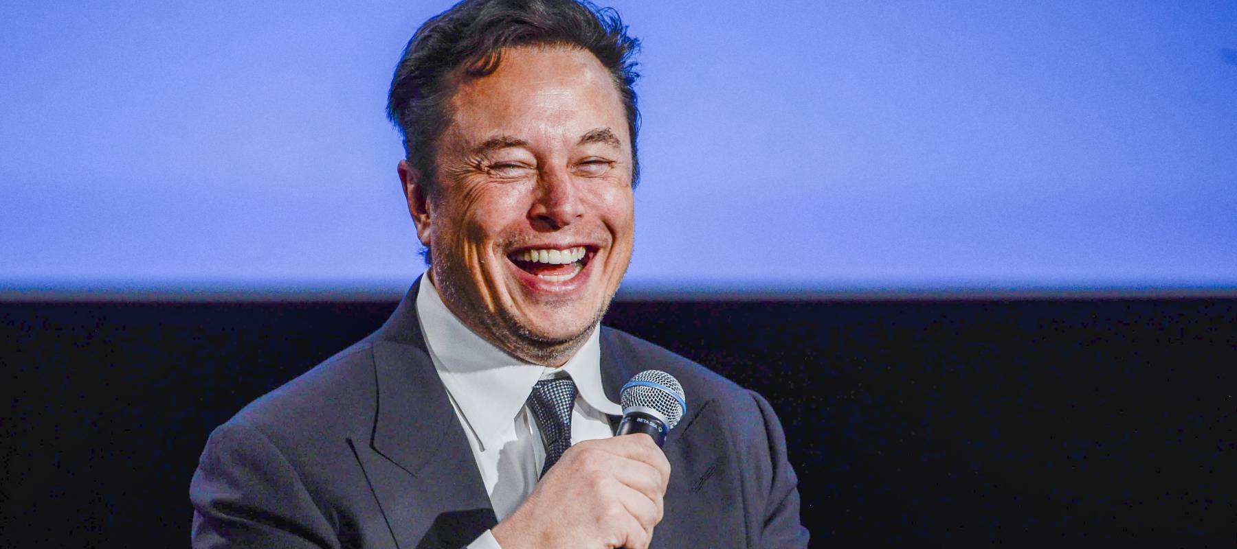 Tesla CEO Elon Musk smiles as he addresses guests at the Offshore Northern Seas 2022 meeting in Stavanger, Norway, Aug. 29, 2022.
