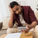 Cash and credit cards in a wallet