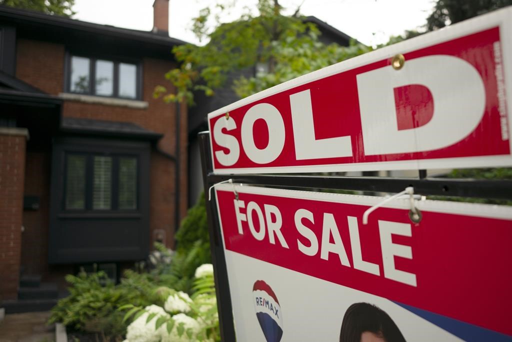 Greater Toronto home sales and listings were up in February from last year, but adjusted sales were down from a month earlier, the region&#039;s real estate board said Tuesday. A west-end Toronto 
