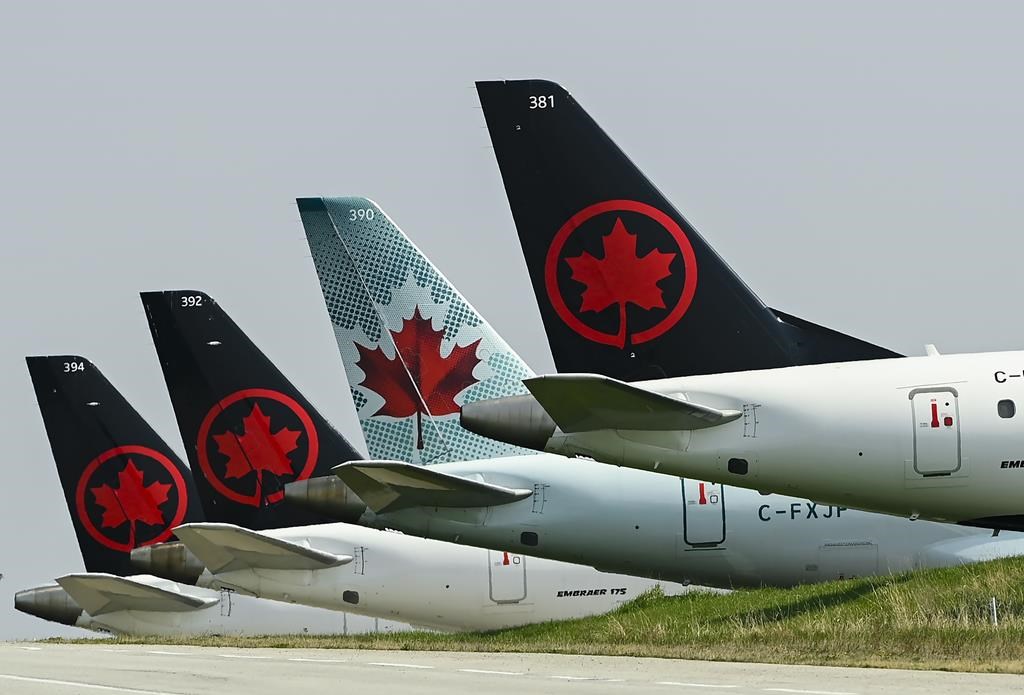 Grounded Air Canada planes sit on the tarmac at Pearson International Airport during in Toronto on Wednesday, April 28, 2021. 