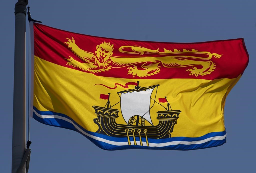 New Brunswick&#039;s provincial flag flies in Ottawa, Monday, July 6, 2020. 